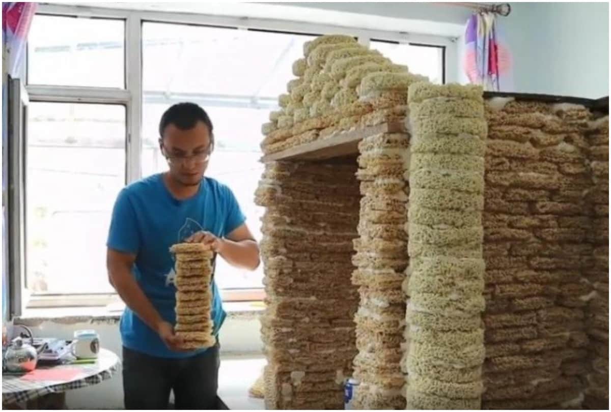 man builds childrens playhouse by instant noodle