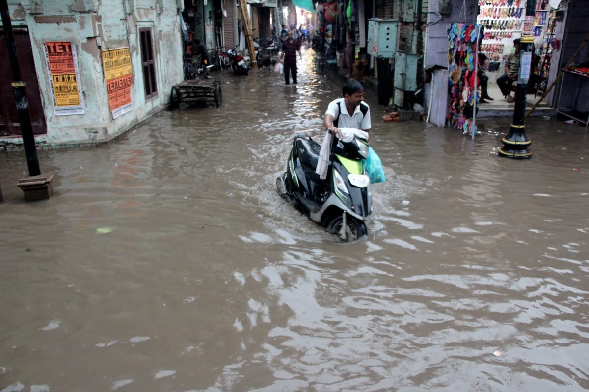 waterlogging sunken roads dilapidated house collapses due to heavy rain in varanasi