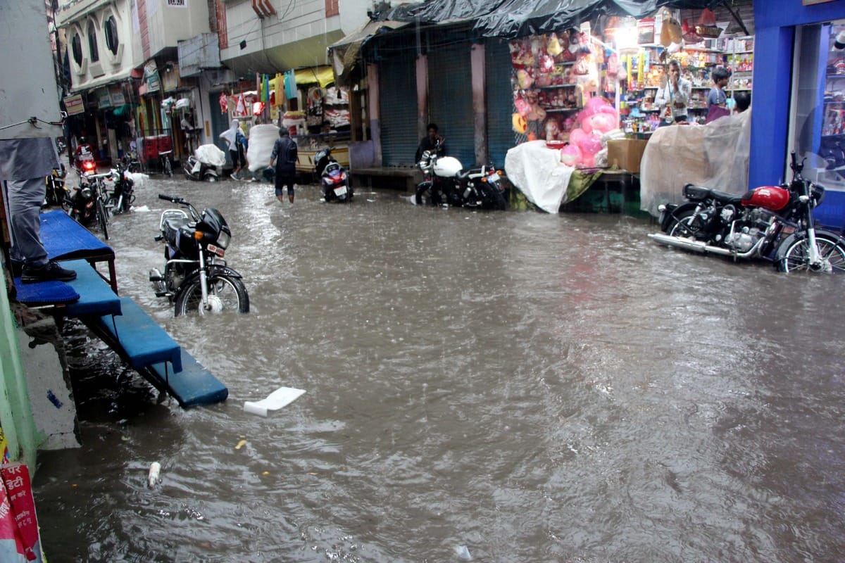 waterlogging sunken roads dilapidated house collapses due to heavy rain in varanasi