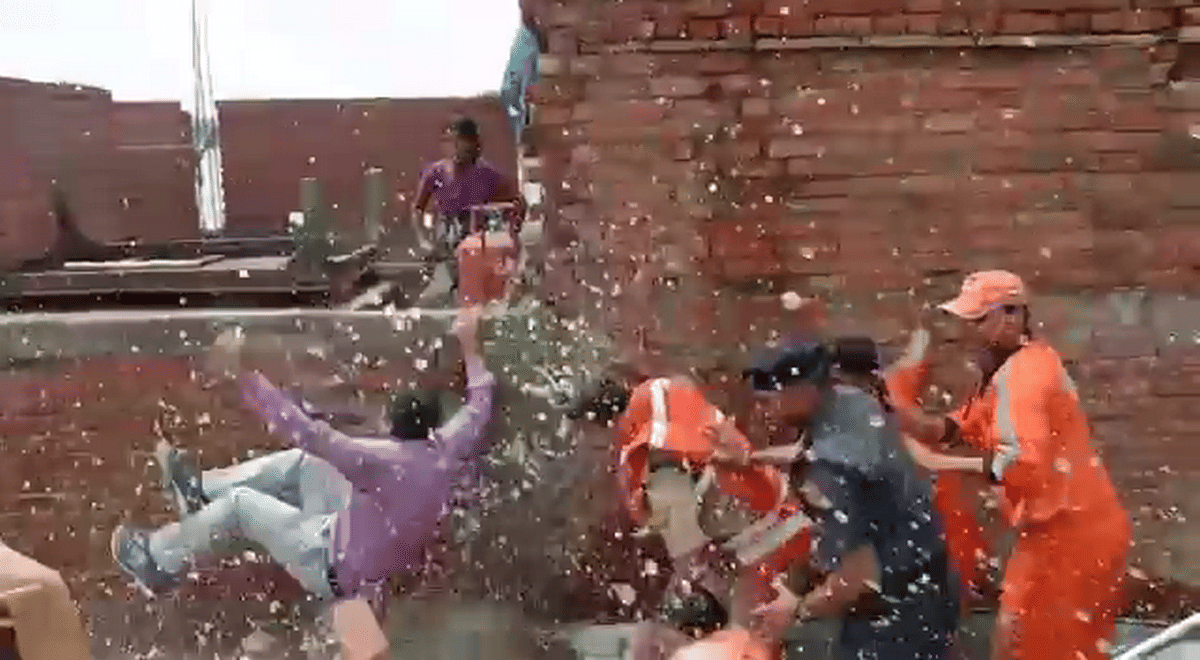 wall fell on DM during distribution of relief material to flood victims in varanasi