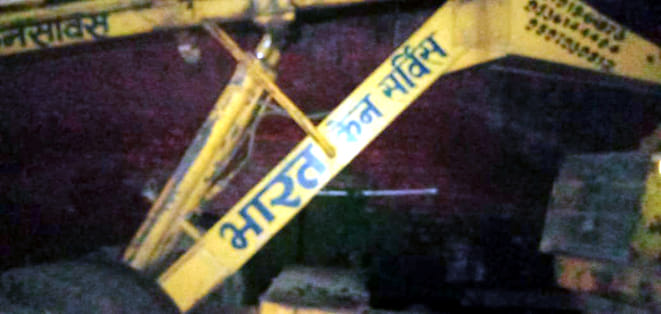 Crane overturning stranded truck, two dead