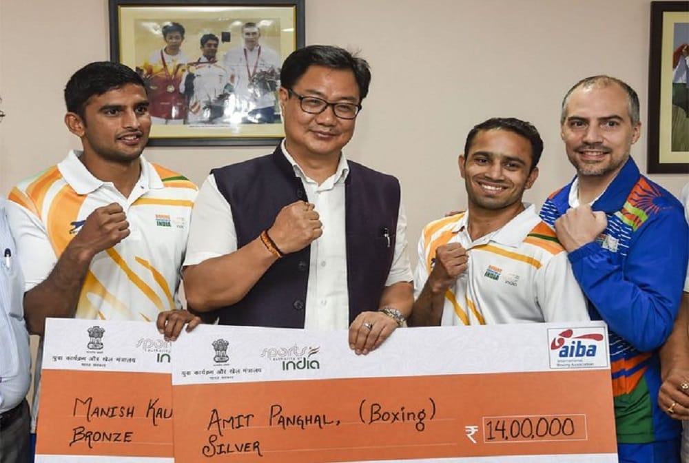 Sports minister Kiren Rijiju felicitates boxers amit panghal, Manish Kaushik with cash awards 