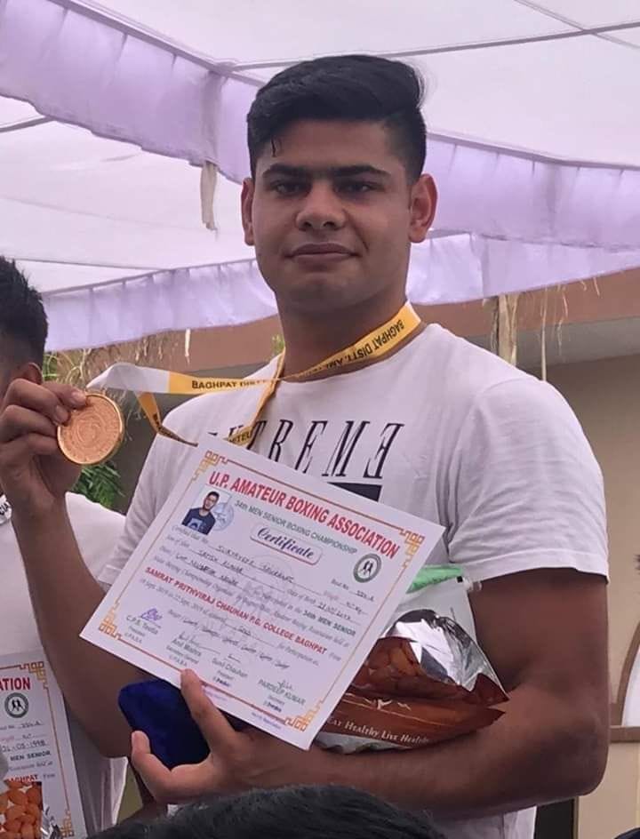 Two brothers won gold medals in boxing