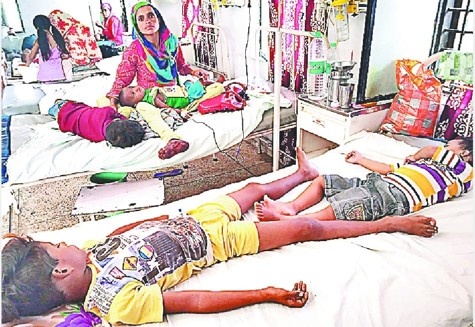 Children suffering from changing weather, two sick on one bed