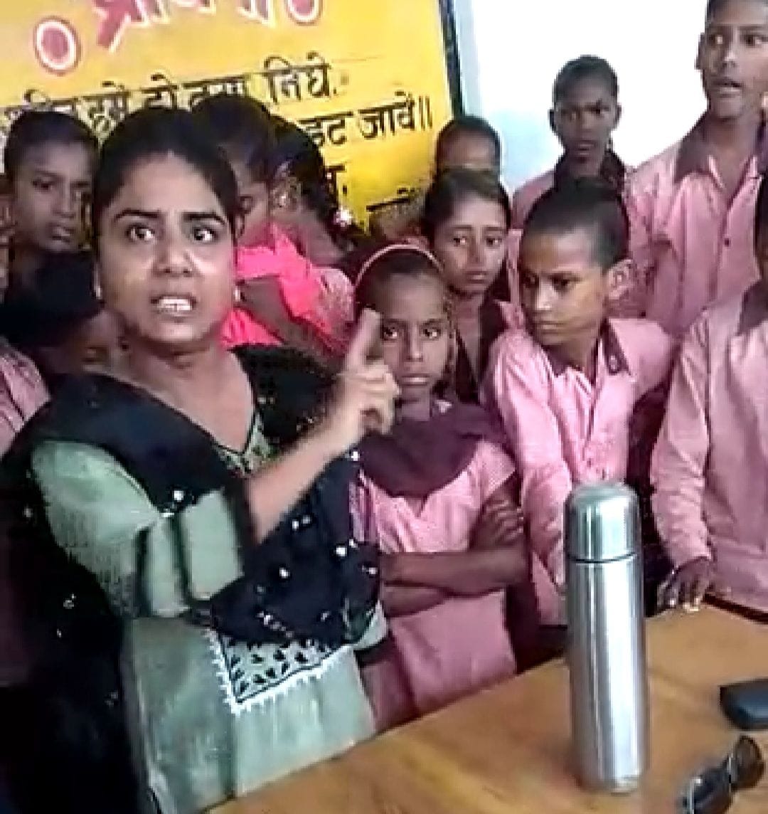 People gathered during a fight between teachers in Phulpur's former secondary school Babupur Bela