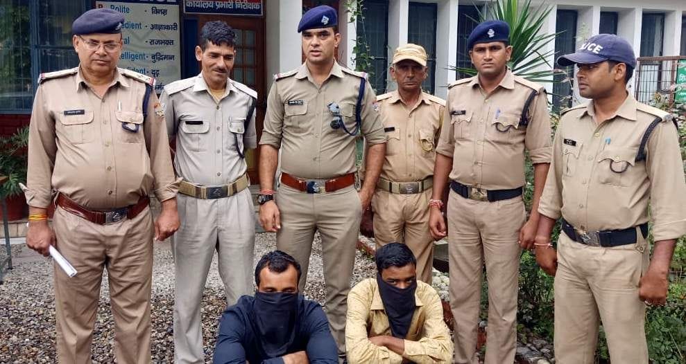 Two arrested with 465 cases of English liquor
