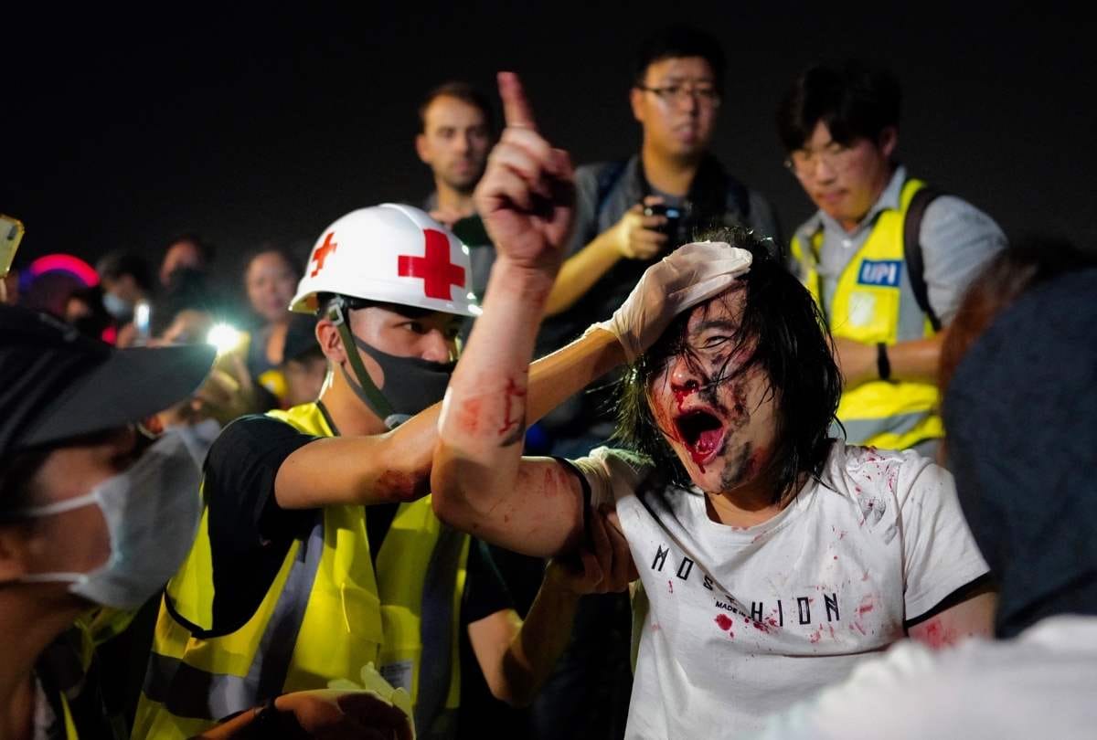 Hong Kong police fire tear gas and water cannon to halt protest