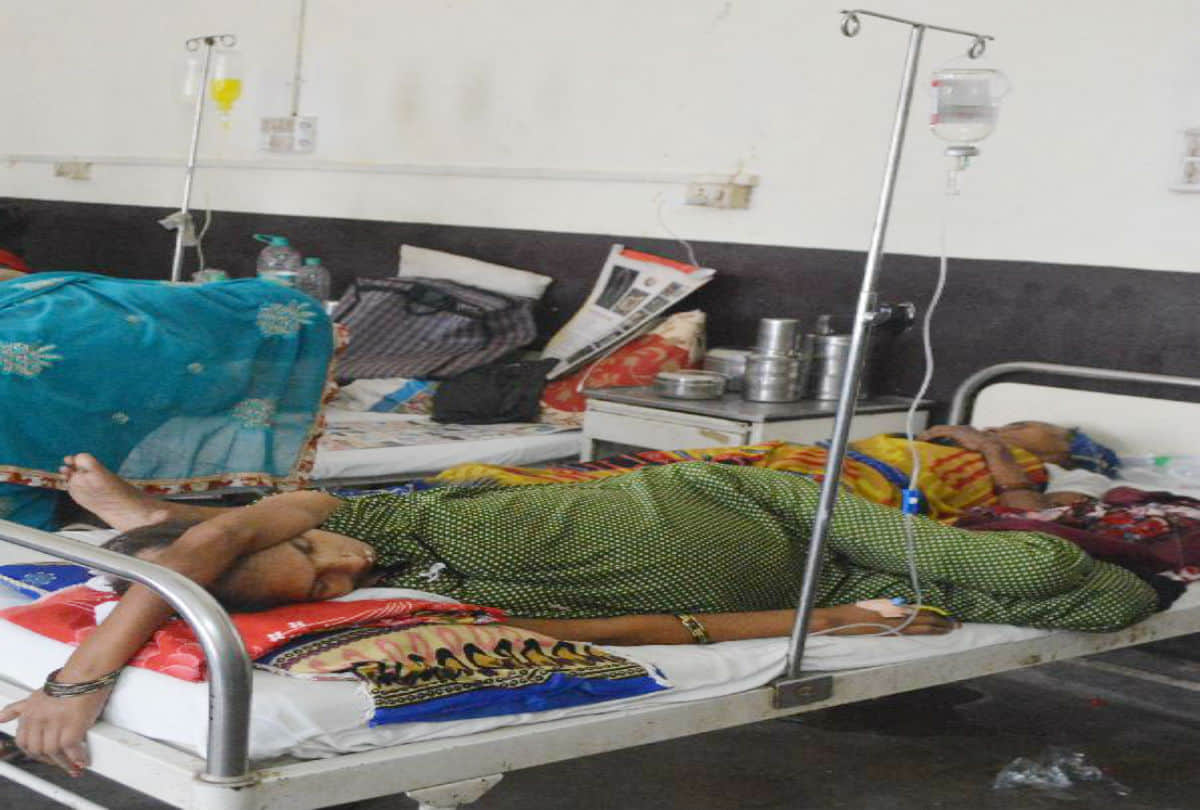 three patients on one bed in the Cancer Department of SN Medical Collage Agra