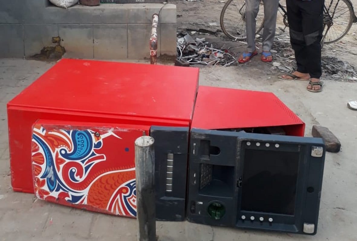 Thieves uprooted ATM, found lying outside cabin