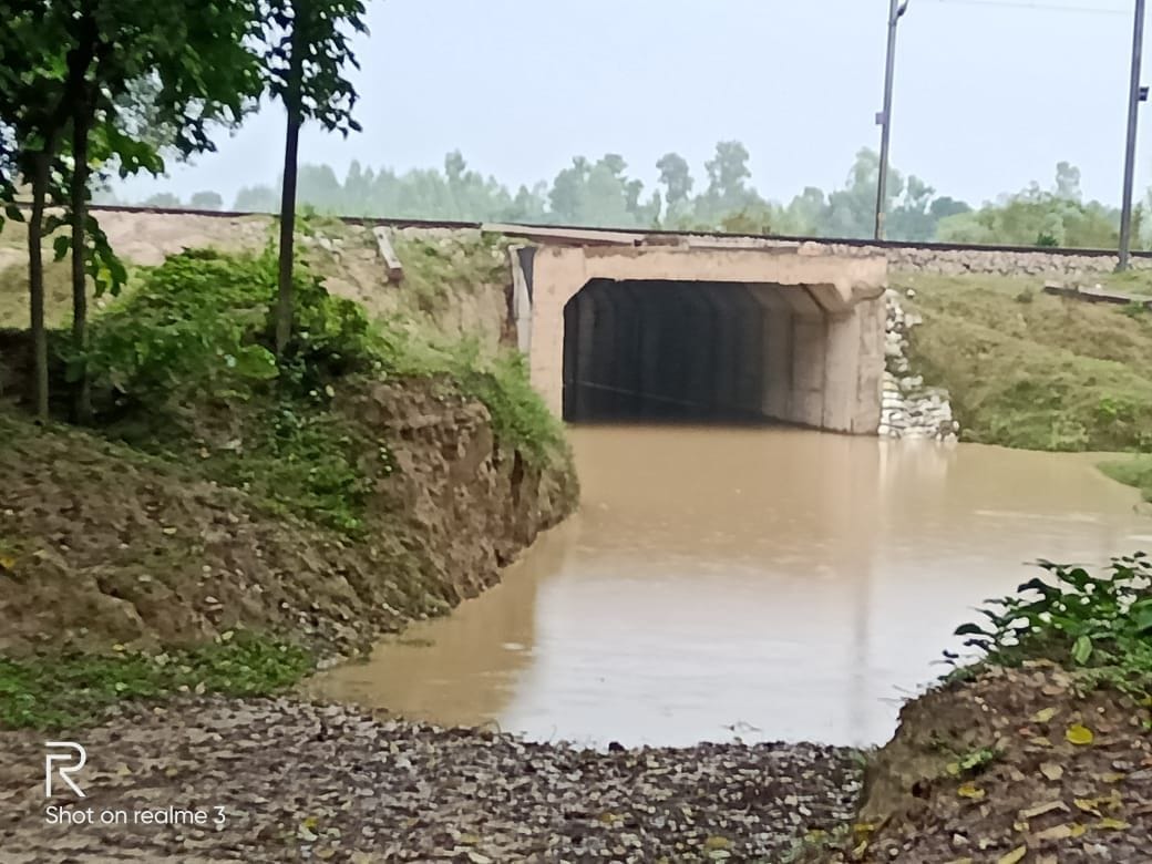 Water filled on railway under pass route, road closed