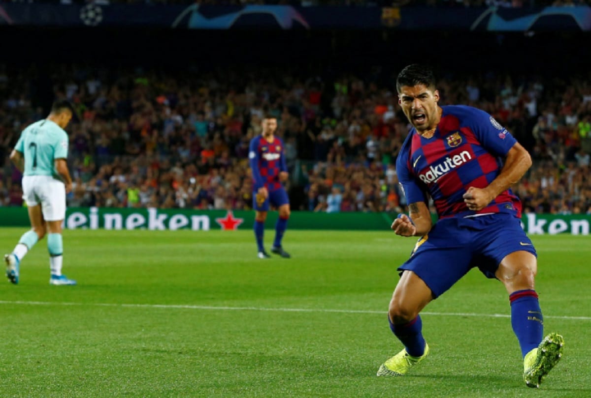 luis suarez helps barcelona to defeat inter milan in champions league