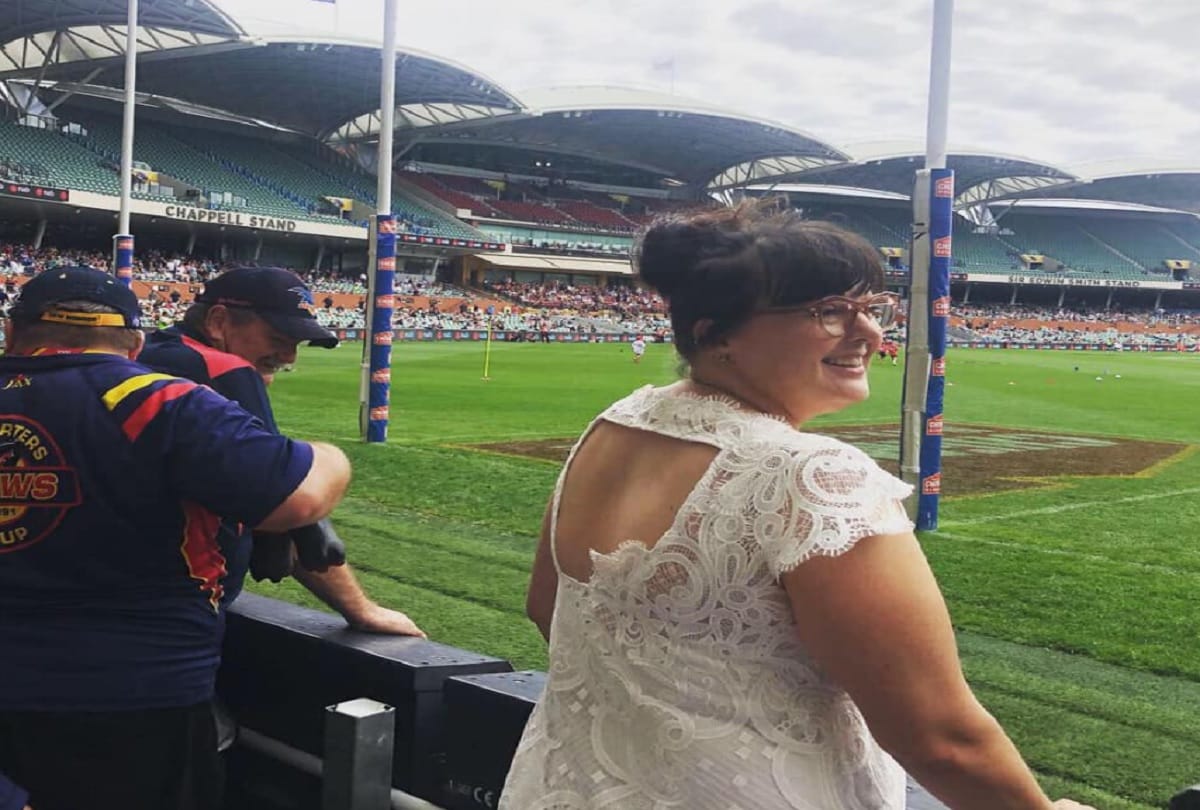 Australian Woman wears wedding dress everywhere a year after her wedding
