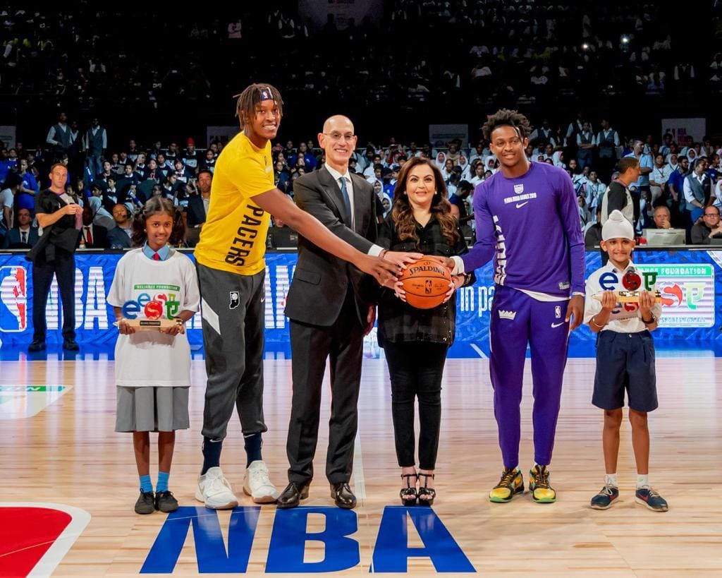 Nita Ambani presents ceremonial Match Ball on the court at NBA first ever game in India