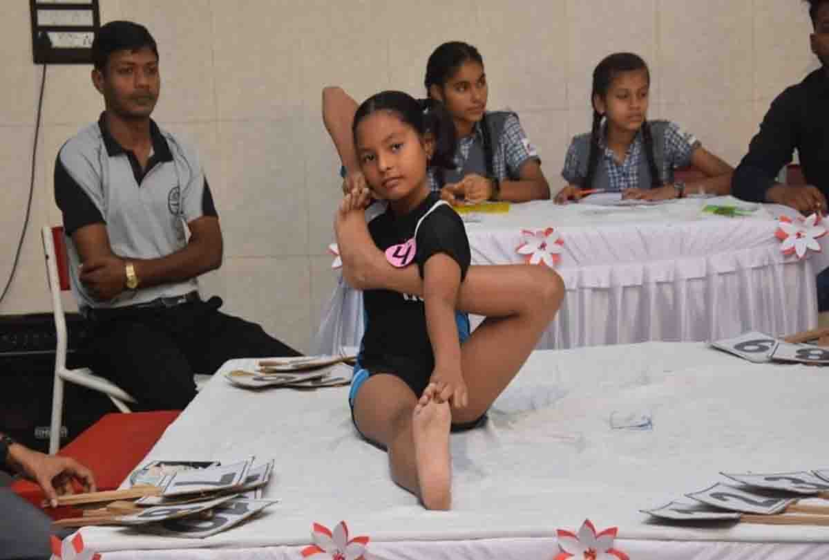 kids participate in yoga competition