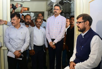 transport minister visits transport office, join line with people with documents to get dl