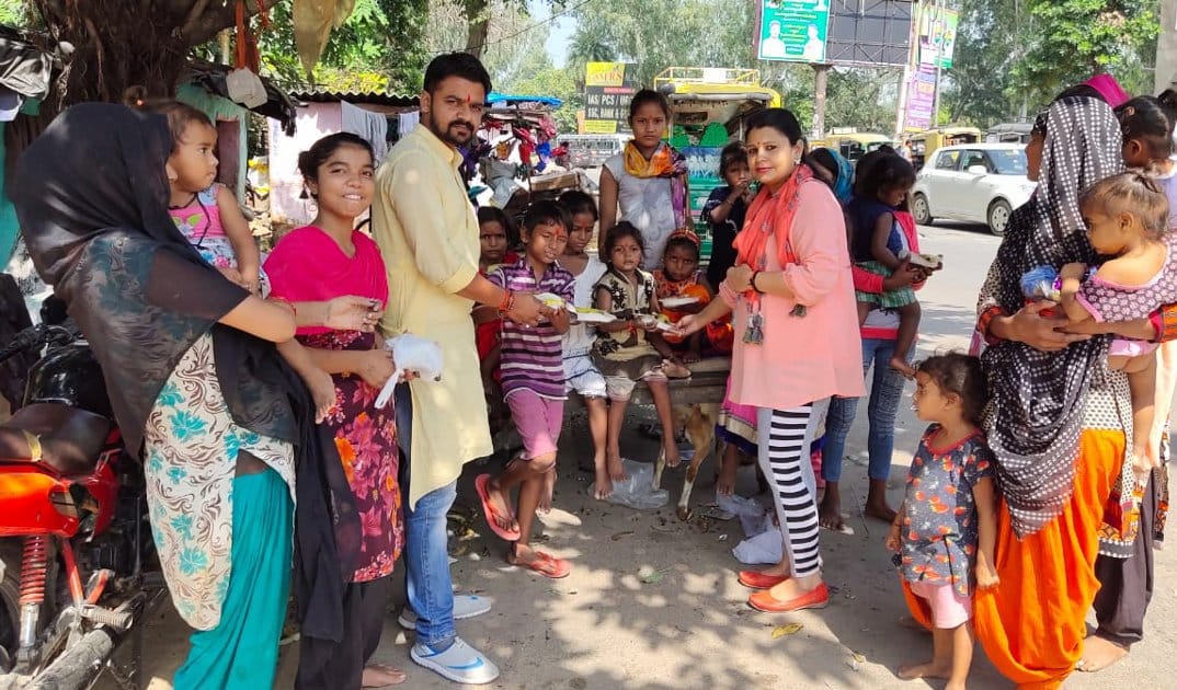 Devotees opened fast by providing food to girls