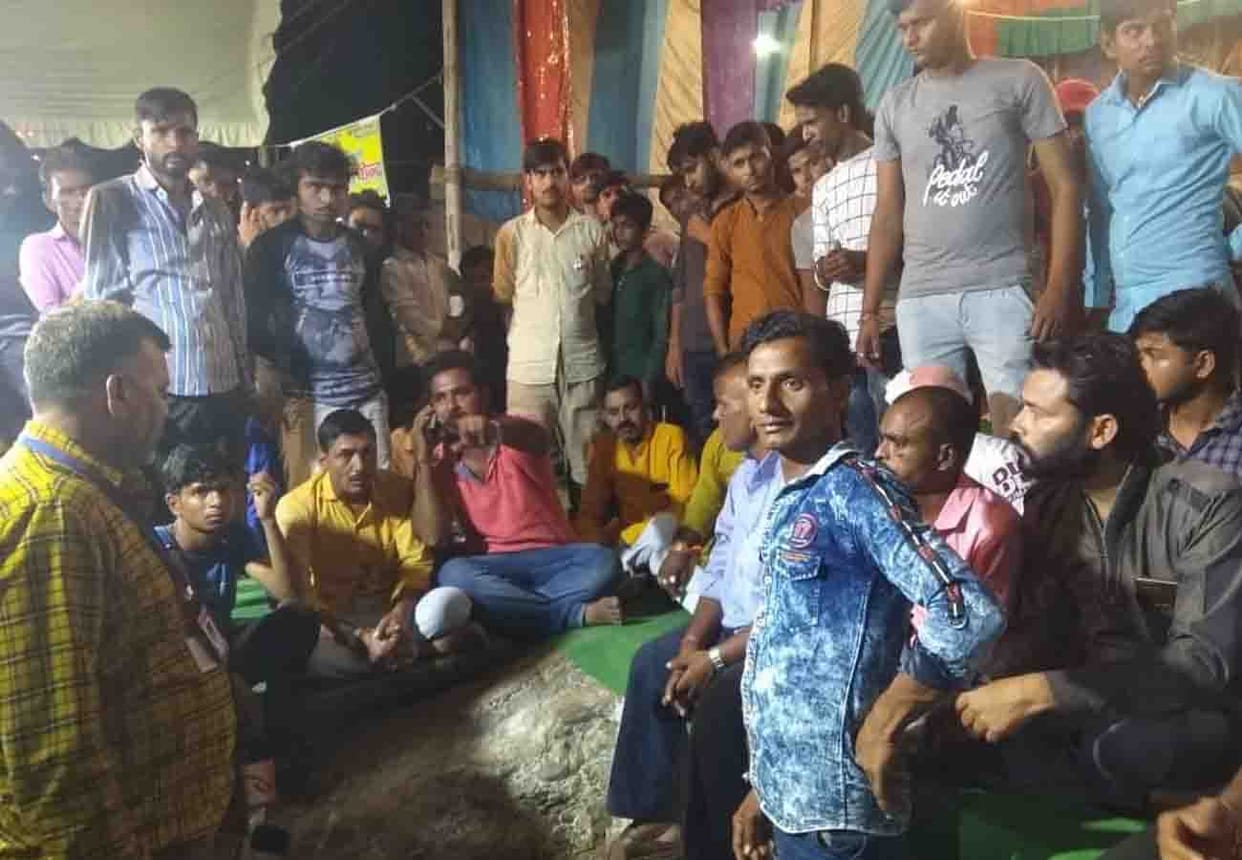 A young man showing vulgar action in ramlila mahotsav auraiya
