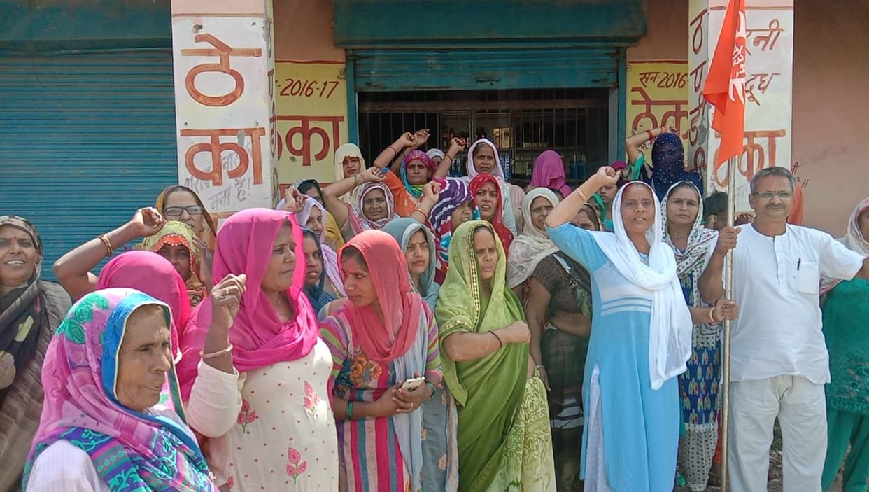 women protest selling of wine in village