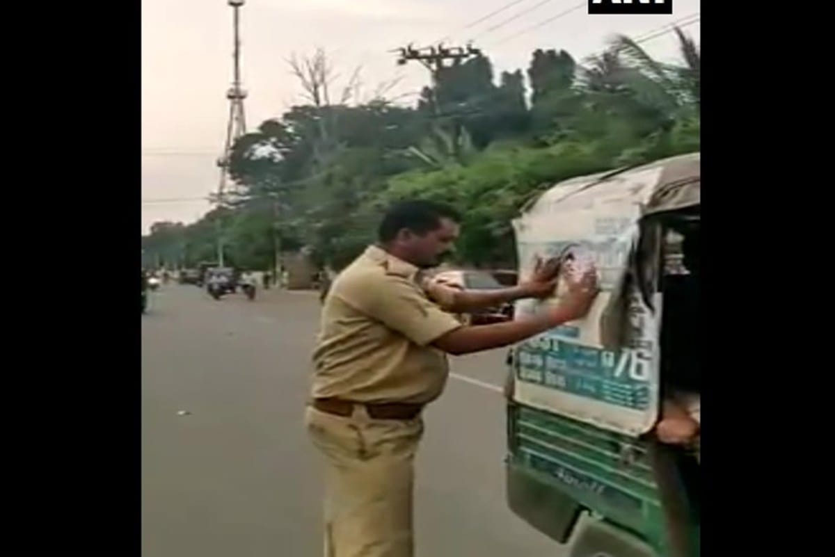 RTA officials paste stickers on autos which show that auto drivers are thankful to CM Jaganmohan