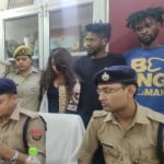 पुलिस द्वारा ठगी के मामले में गिरफ्तार युवती व विदेशी युवक