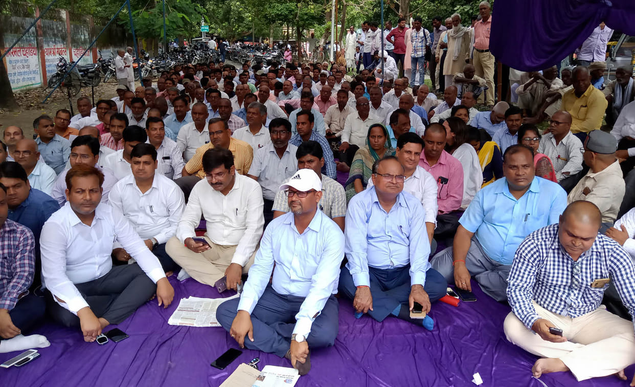 revenue employees opposed merger of consolidation department