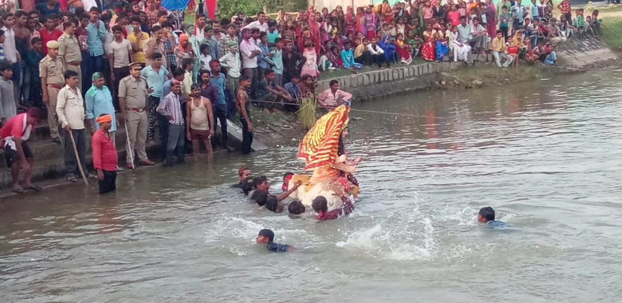 Statues immersed in canals and ponds
