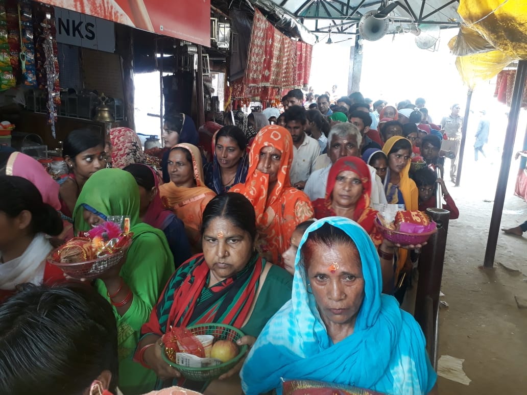 Devotees thronging the court of Adi Shakti