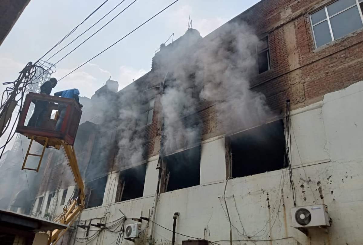 faridabad vivo mobile company catches fire after short circuit in fan relief work continue