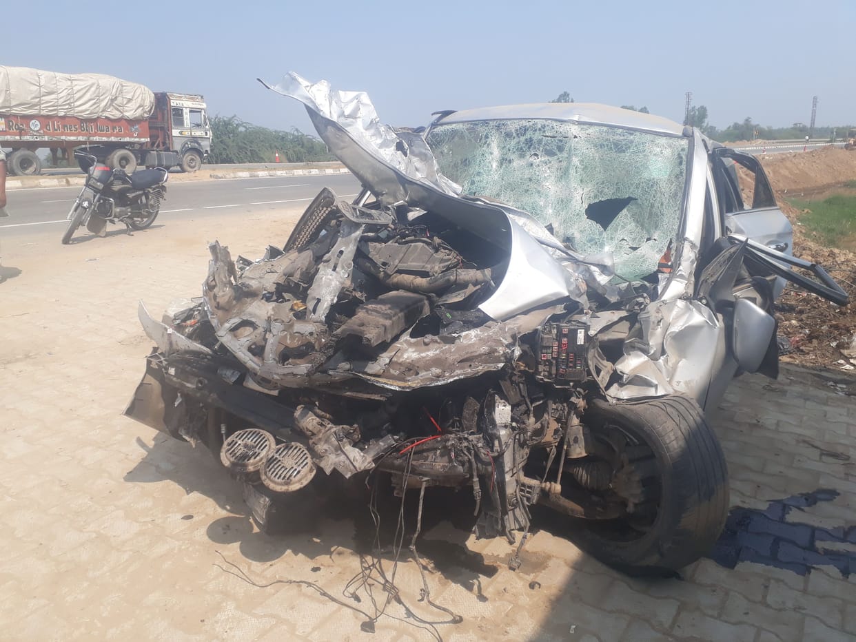 three killed in truck collision with car  divider
