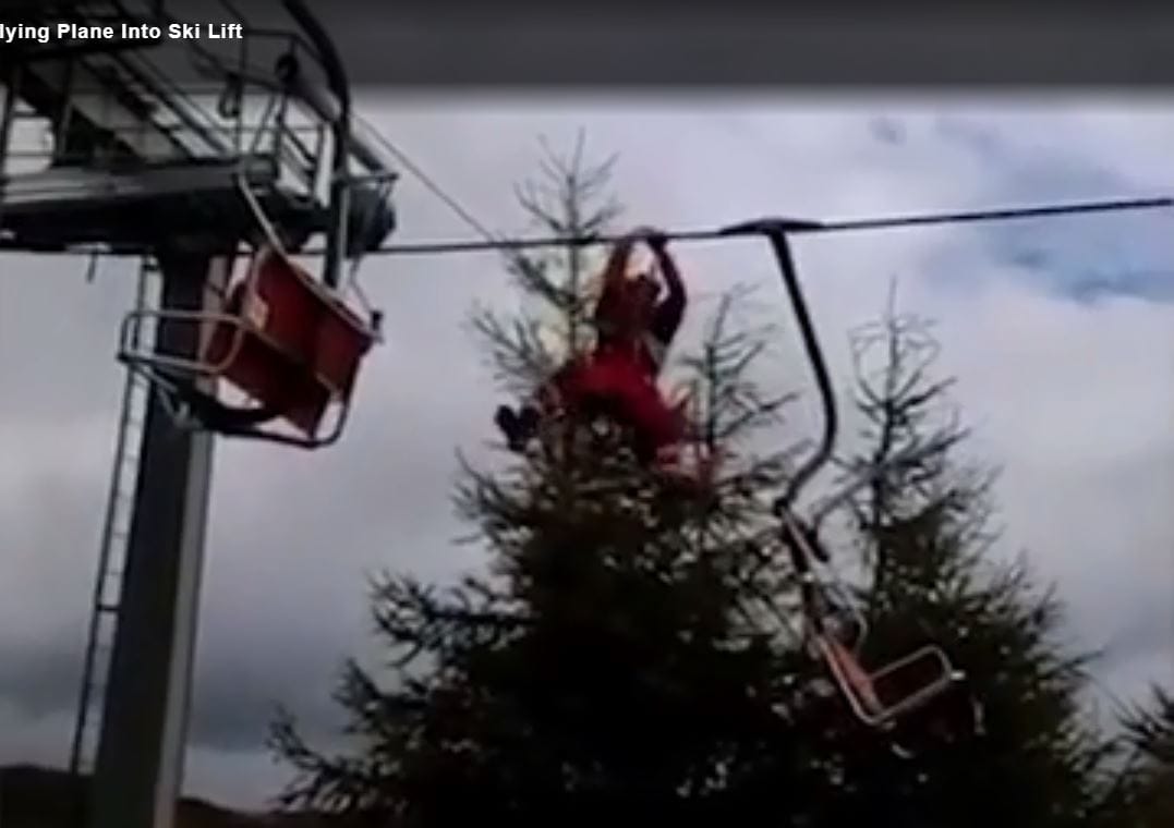 A Small Plane Dangles Upside Down From Ski Lift Cables After Crash In Italian alps