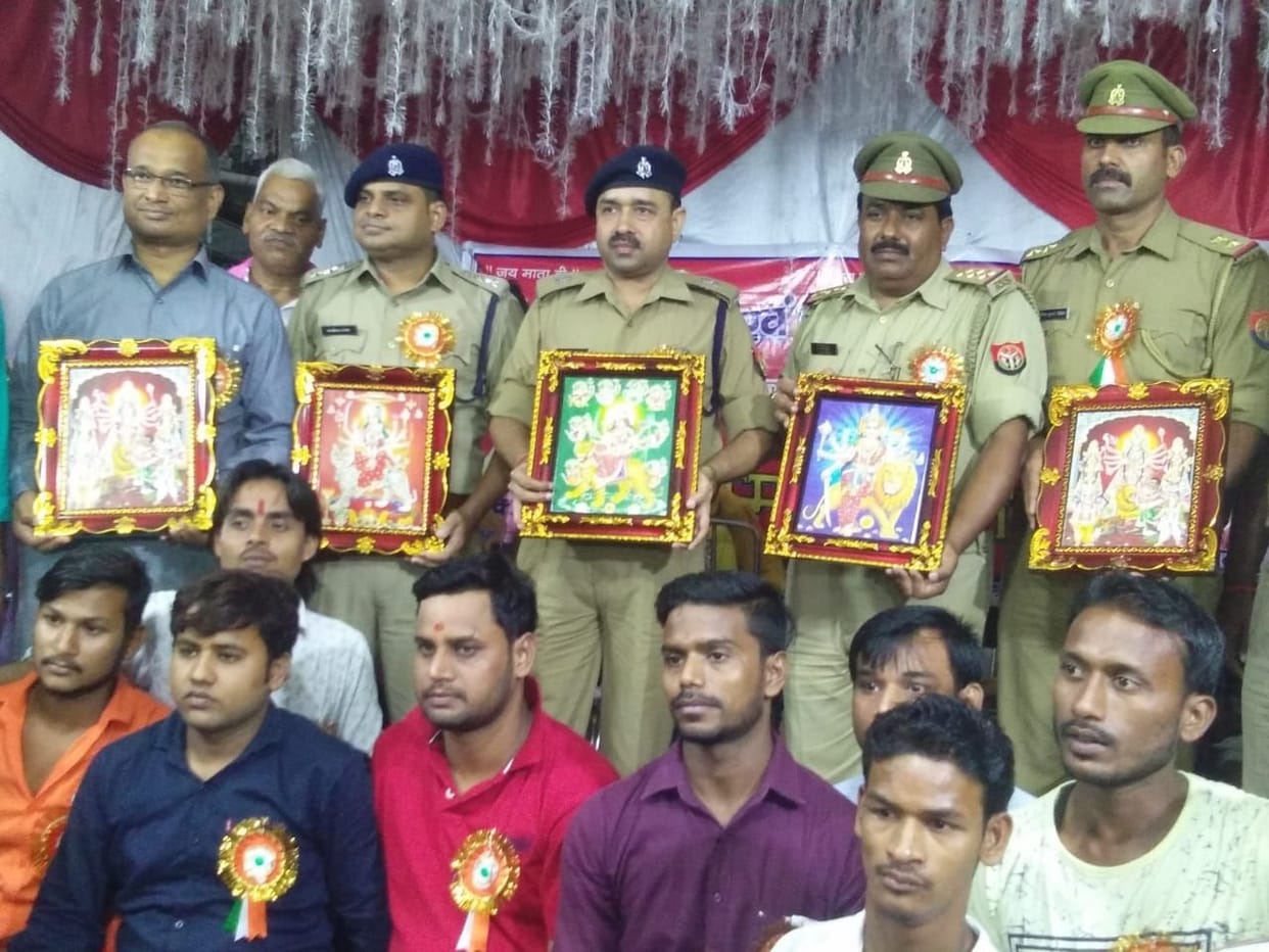 Officers and officials of Durga Puja committees honored