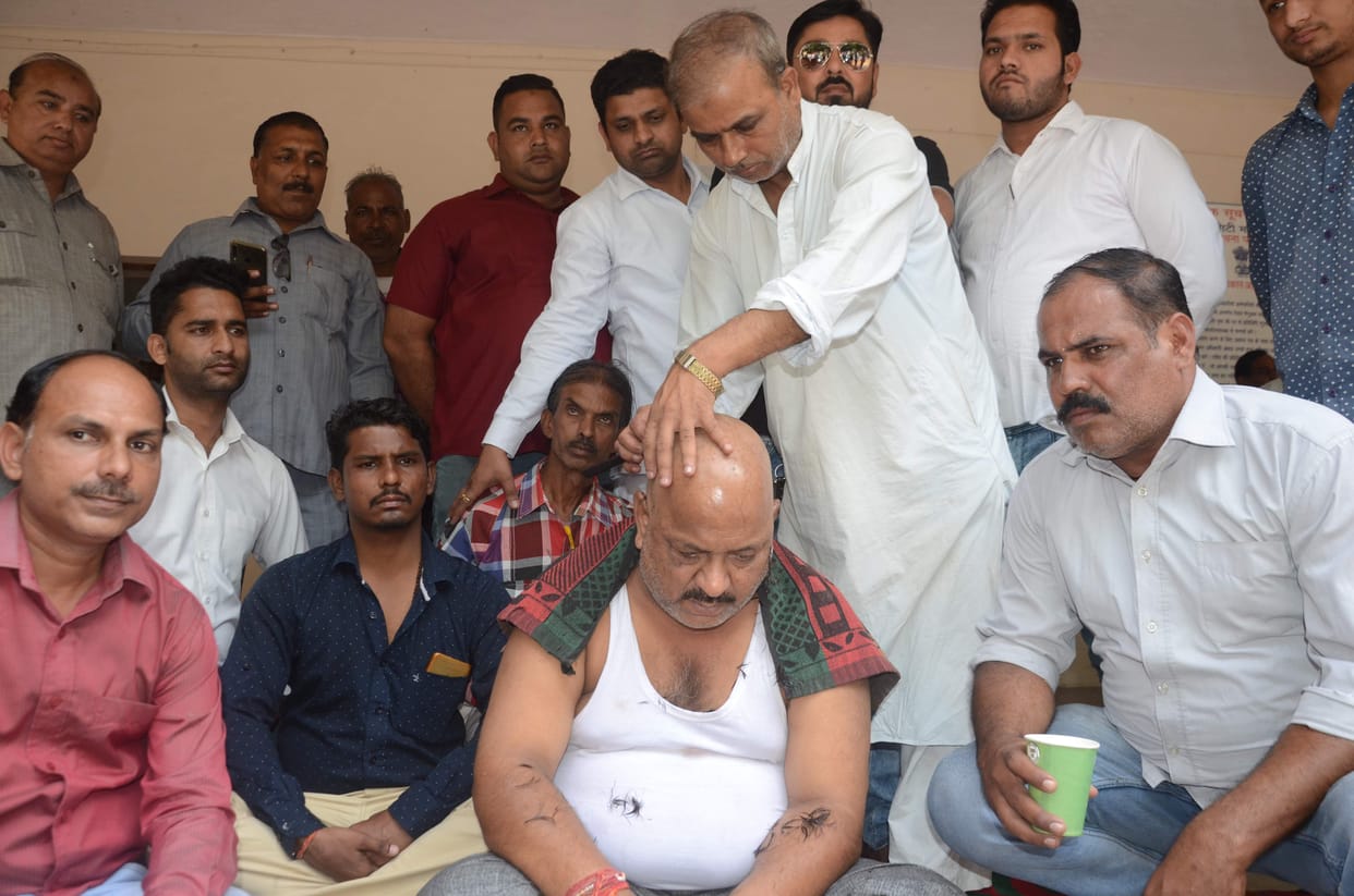 The mayor's husband shaved his head after the councilor changed his face