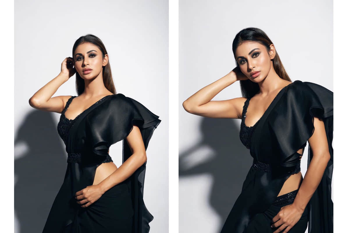 mouni roy looks gorgeous in black saree for film promotion