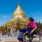 Person on Wheel Chair at Temple