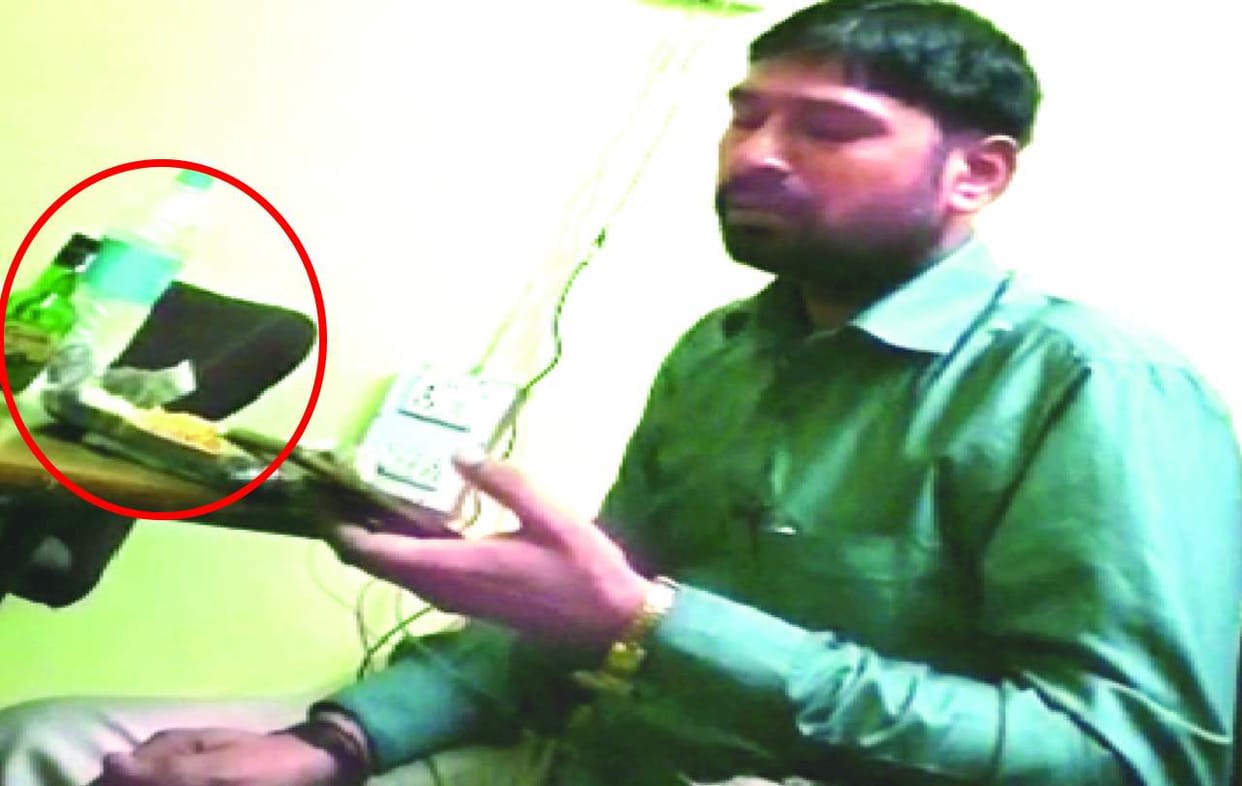Bulandshahr bsa office man drinking alcohol in office video viral he suspended