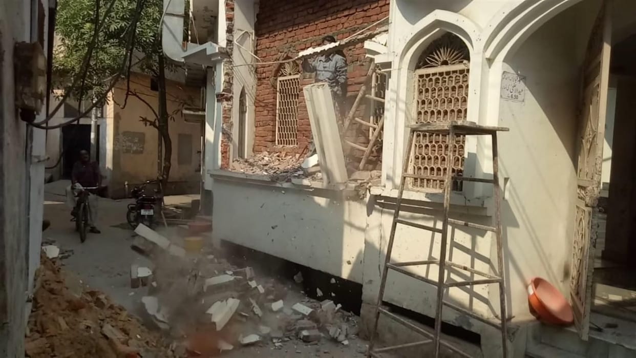 mosque wall retracted four feet