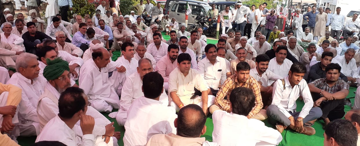 BJP government is harassing farmers and laborers