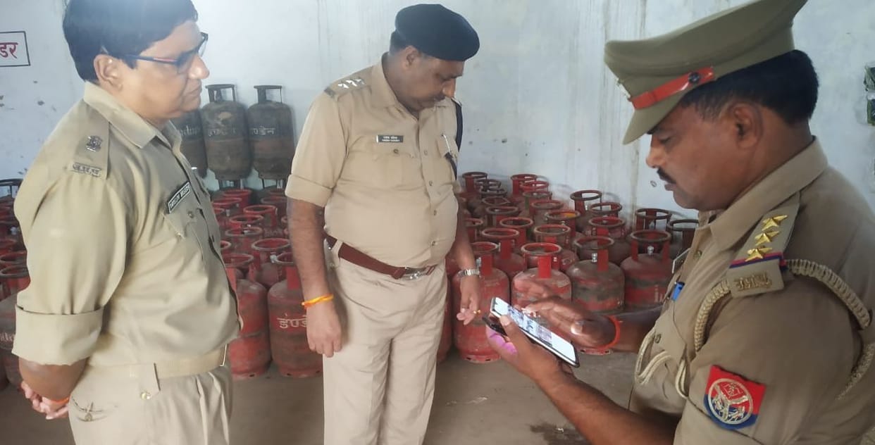 70 cylinder looted , security guard  hostage