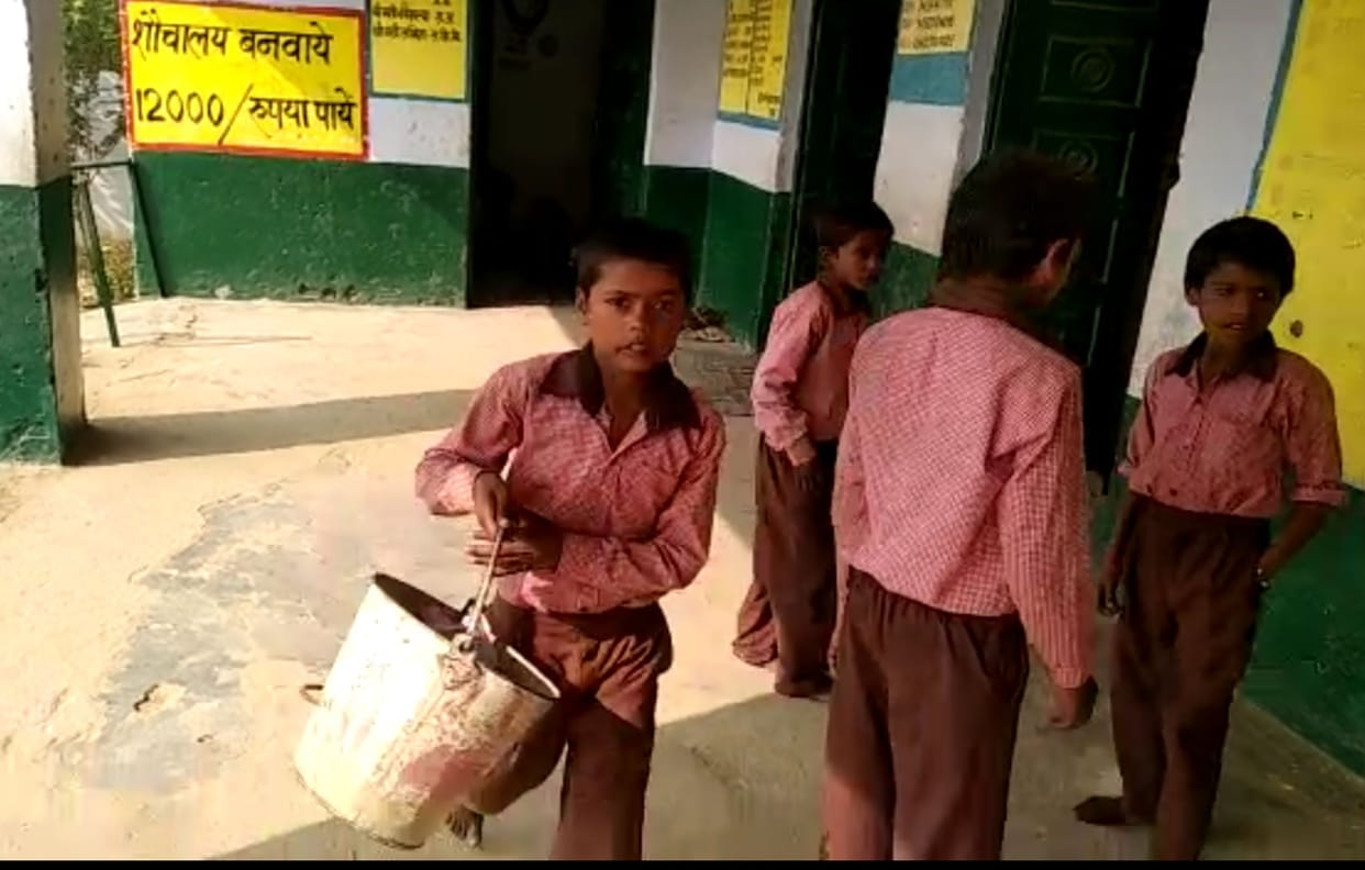 students swiping in school