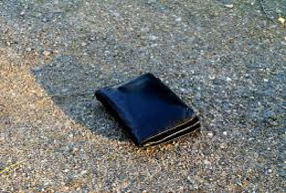 Man wallet lost in local train found by cops after 14 years Mumbai local trains