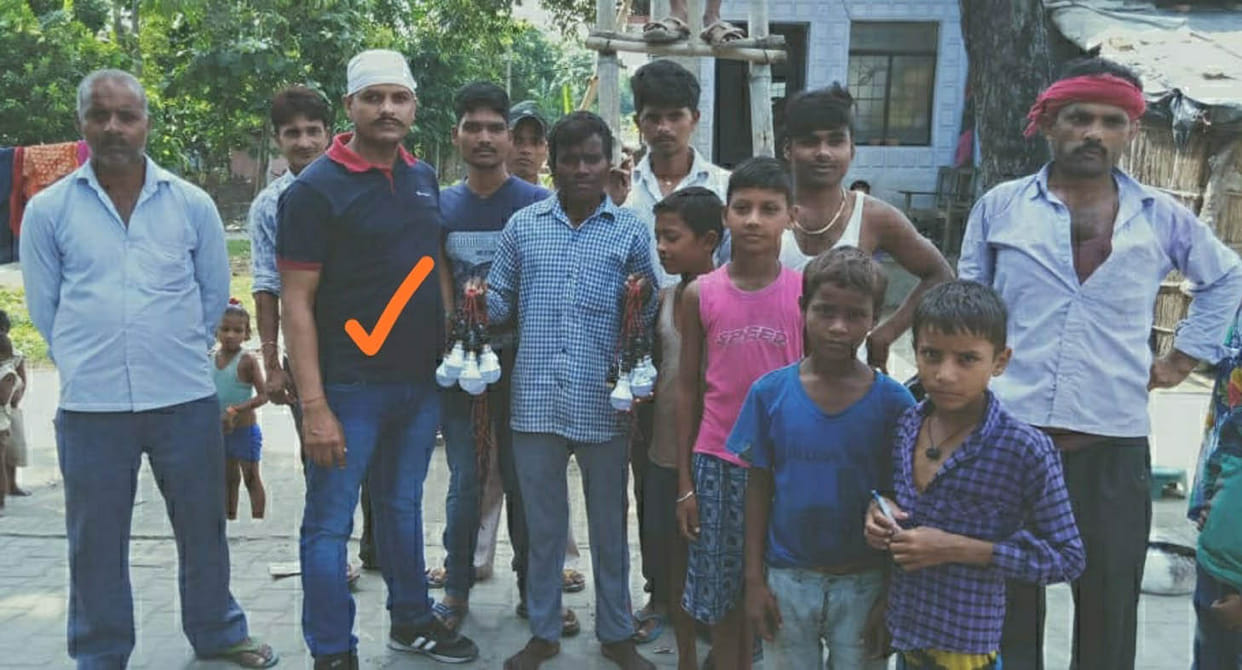 army personel enlighten village