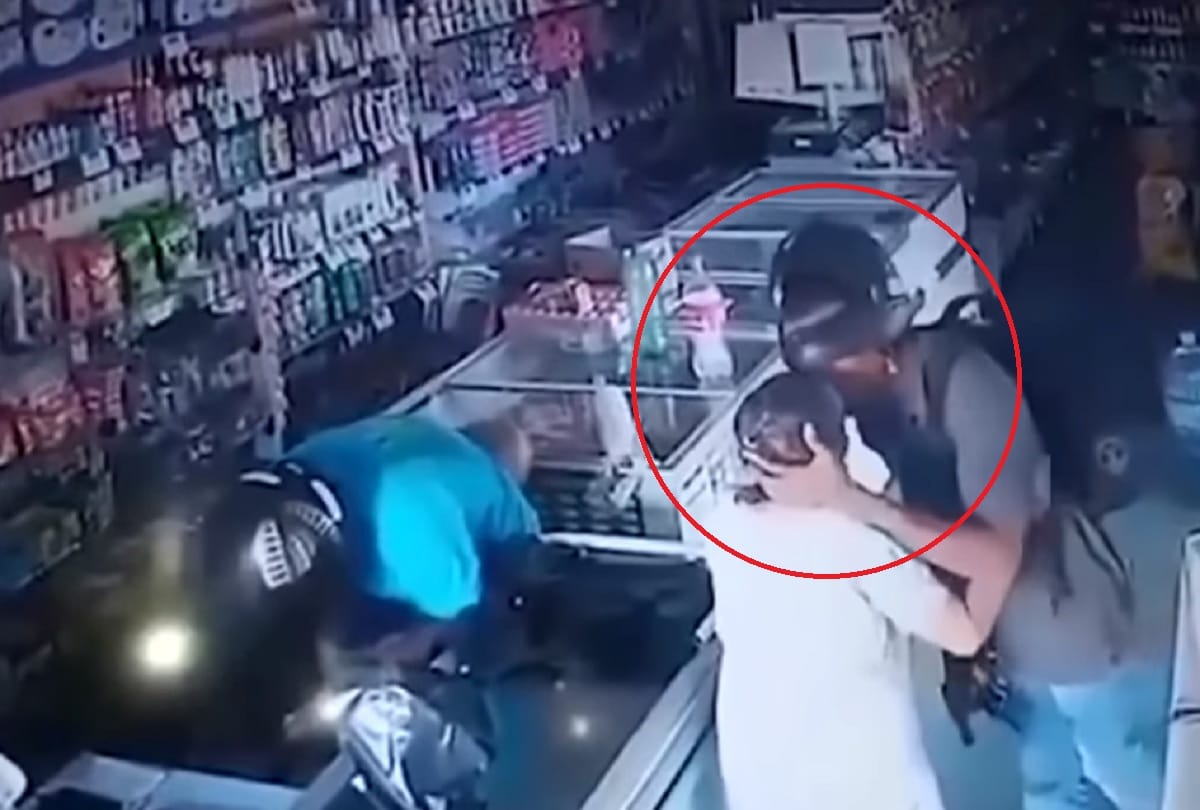 Armed robber kisses elderly woman and refuses to take cash inside a pharmacy in brazil video viral
