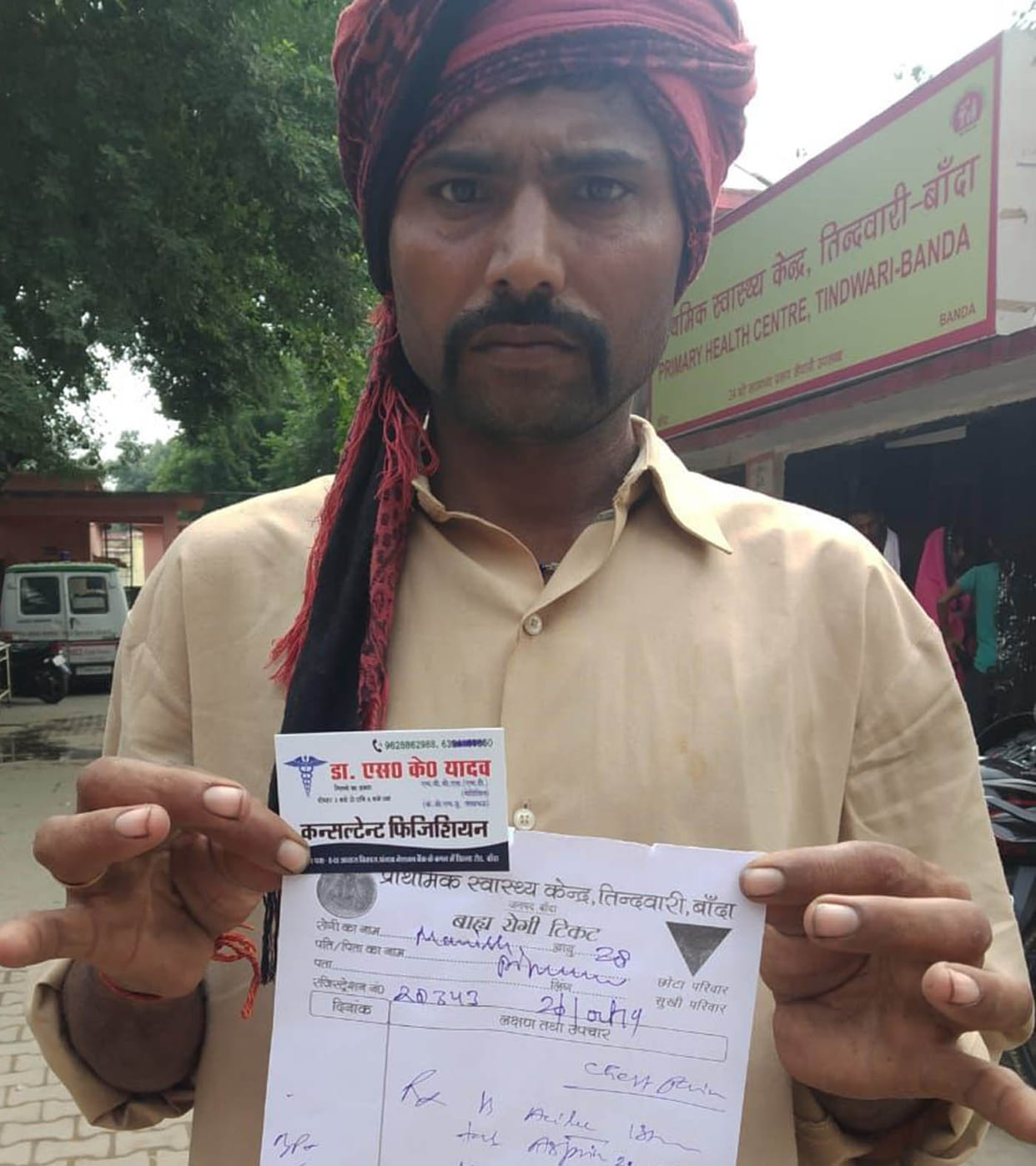 Doctor's visiting card with prescription in PHC