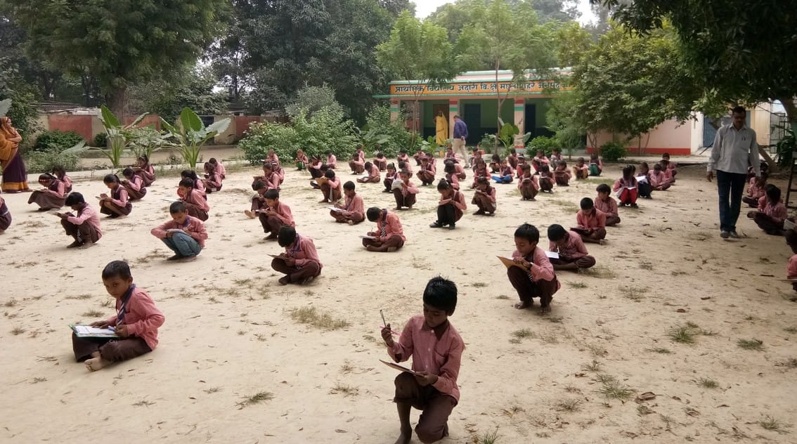 Sitting on the ground, the naval exam