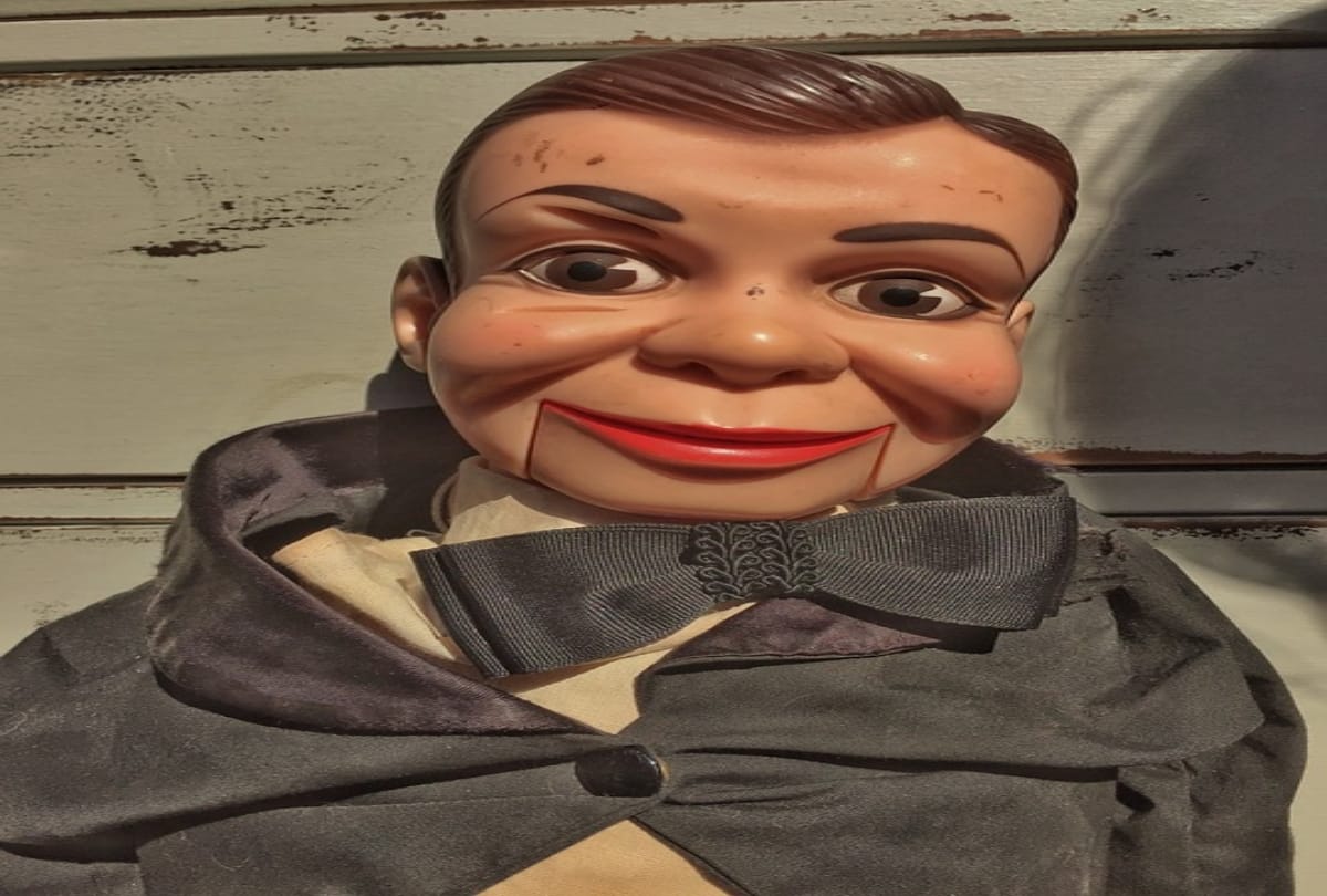 haunting moment ventriloquist doll blinks and moves its mouth