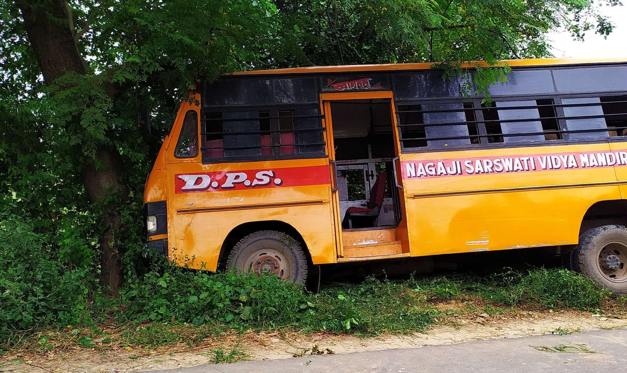 School bus carrying 60 children collides with tree