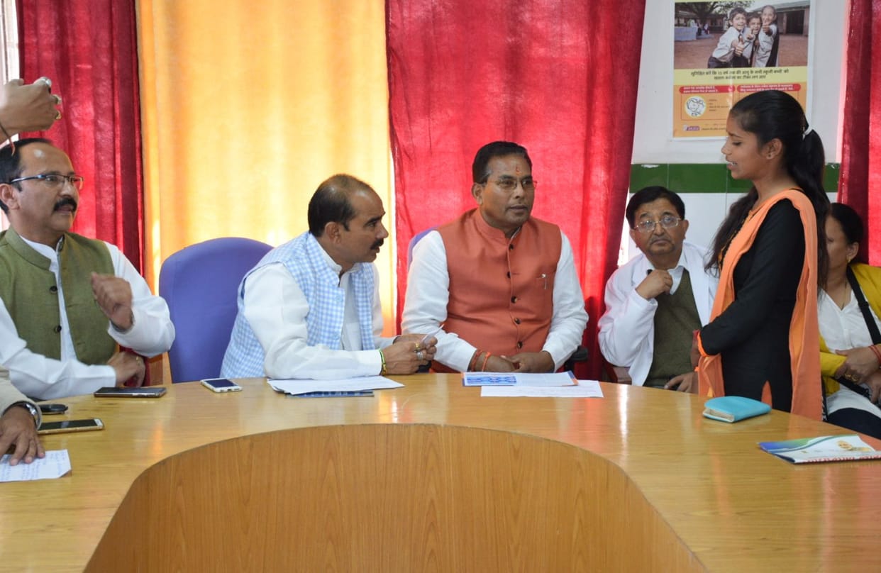 MP Ajay Tamta talks with the beneficiaries of Ayushman
