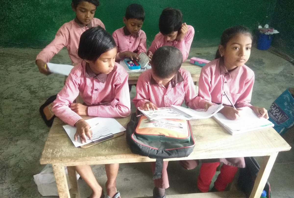 one teacher is monitoring two classes during exam as a teacher scarcity