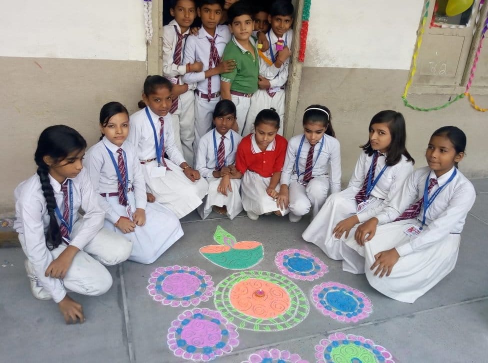 Talent shown in rangoli and card making competition