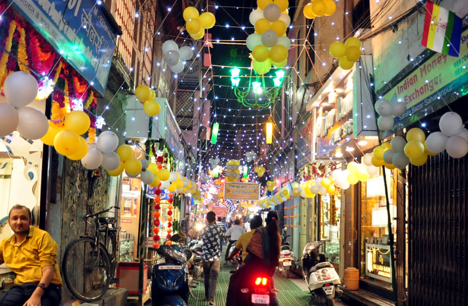 City illuminated by colorful lights